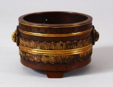 A GOOD CHINESE BRONZE CENSER, the exterior with a central band of gilded decoration, four