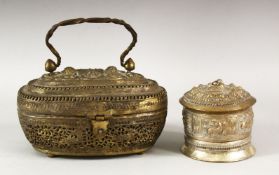 A BURMESE WHITE METAL CIRCULAR BOX AND COVER, with embossed and chased decoration, 9cm diameter,