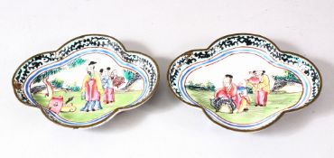 A PAIR OF CHINESE CANTON ENAMELLED DISHES, painted with figures in landscape settings, 9.5cm x 7.