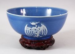 A CHINESE ROBINS EGG GLAZED PORCELAIN BOWL & STAND - the bowl with triple monochrome phoenix birds -