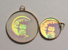 TWO GOLD OWL PENDANTS.