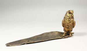 A GOOD BRONZE OWL AND FEATHER INKWELL in the Vienna style. Signed 13ins long.