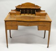 A SHERATON REVIVAL LADIES MAHOGANY AND SATINWOOD BANDED WRITING DESK, the upper section with two