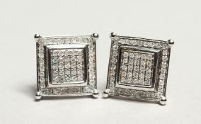 A PAIR OF WHITE GOLD AND DIAMOND SQUARE EAR RINGS.