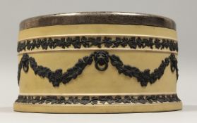 A WEDGWOOD YELLOW AND BLACK CIRCULAR BOWL with plated rim. Impressed mark 'WEDGWOOD', 9.25ins