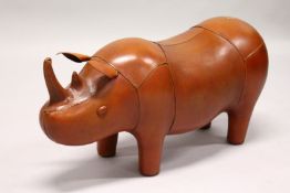 A LEATHER HIPPO FOOT STOOL.