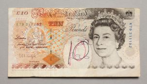 A BANK OF ENGLAND £10.00 NOTE No. K79 311182 printed wrongly, half centimetre space to the bottom.