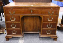A GOOD GEORGE III MAHOGANY PEDESTAL KNEEHOLE DESK