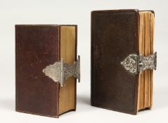 TWO SILVER MOUNTED,CONTINENTAL, LEATHER NEW TESTAMENTS.