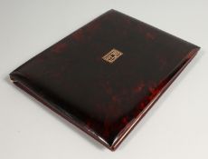 A VICTORIAN TORTOISESHELL BLOTTER with gold initials. 10.5in x 8.5ins.