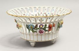 A DRESDEN PORCELAIN BASKET, pierced sides with floral painted and encrusted decoration 7.5ins