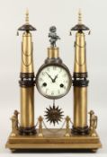A DOUBLE COLUMN CLOCK with drum movement. 24ins high.
