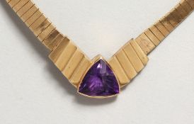 A 14CT GOLD AND AMETHYST NECKLACE 39gms