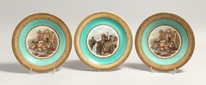 A PAIR OF LATE 19TH CENTURY PRATTWARE PLATES, depicting figures and animals at lakeside by ruins,