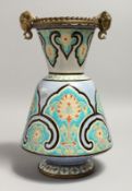 AN ALHAMBRA POTTERY VASE with moulded and painted decoration in the Islamic style, with gilt metal