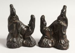 A PAIR OF 18TH CENTURY PORCELAIN GUANYIN WATER DROPPERS 6.5ins high.