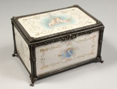A VERY GOOD 19TH CENTURY IVORY JEWEL BOX painted with cherubs with silver mounts on claw feet,