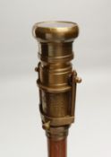 A NOVELTY WALKING STICK with COMPASS handle. 38ins long.
