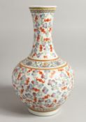 A 19TH CENTURY CHINESE BULBOUS VASE printed mark and drilled 16ins high.