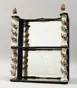A SMALL PAIR OF MAHOGANY SHELVES with porcelain supports 12ins high 9ins wide