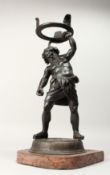 A GOOD 19TH CENTURY BRONZE OF THE GREEK GOD SILENUS, wrestling a serpent above his head, on a marble