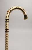 A GOOD VERTEBRAE WALKING STICK 35ins.