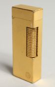 A GILT DUNHILL LIGHTER