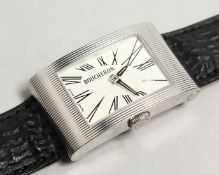 A BOUCHERON WRIST WATCH NO. 090 6233. with leather strap.
