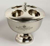 A MOET AND CHANDON FOUR BOTTLE COOLER