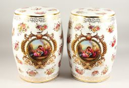 A PAIR OF FLORAL BARREL SEATS 18ins high.