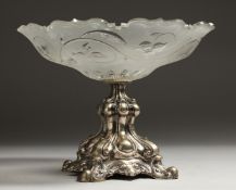 A CRYSTAL COMPORT with silver base. 8.5ins diameter.