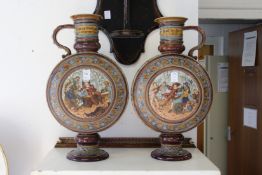 A GOOD LARGE PAIR OF METTLACH GERMAN POTTERY MOON FLASK SHAPED EWERS.