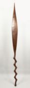 A GOOD MAORI WOODEN PADDEL CIRCA. 1880 - 1900 with twist handle 63ins long. Circa.1920 Provenance: