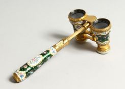 A GOOD PAIR OF 19TH CENTURY FRENCH ORMOLU AND GREEN ENAMEL OPERA GLASSES, with handle, enamel