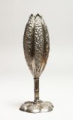 A SMALL CHINESE SILVER VASE 6ins high.