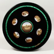 A VERY GOOD 19TH CENTURY ITALIANCIRCULAR SLATE AND EBONISED PEDESTAL TABLE, the top inset with