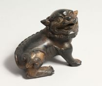 A GILT BRONZE DOG OF FOU 4.5ins long