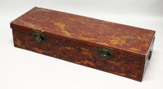 AN EARLY 20TH CENTURY CHINESE RED LACQUER AND CHINOISERIE DECORATED STORAGE TRUNK. 4ft 7.5ins long x