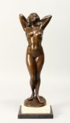 MAUCSCH. A STANDING BRONZE NUDE on a black and white marble base. Signed Maucsch, bronze 14ins
