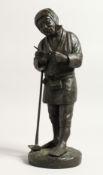 A JAPANESE BRONZE FIGURE of a man holding a pipe 12ins high.