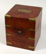 A VICTORIAN MAHOGANY BRASS BOUND DECANTER BOX with fitted interior. 8ins x 10ins
