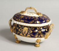 A CROWN DERBY TWO HANDLED TUREEN AND COVER.