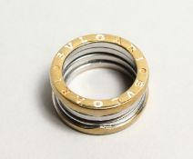 A BULGARI TWO COLOUR GOLD RING