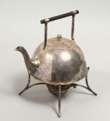 A CHRISTOPHER DRESSER CIRCULAR TEA KETTLE ON STAND with ebony handles, burner and curving legs. 6.