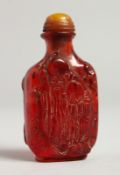 A CARVED AMBER TYPE SNUFF BOTTLE