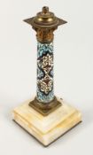 AN ONYX AND CLOISONNE ENAMEL CANDLESTICK 9ins high.