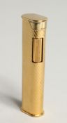 A LADIES GILT DUNHILL LIGHTER