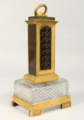 A RARE 19TH CENTURY FRENCH CRYSTAL, ORMOLU AND BRONZE DATE COLUMN 10.5ins high.