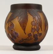 A SMALL AMBER-COLOUR GLASS BOWL, etched with a design of cherries and foliage, signed GALLE. 4ins