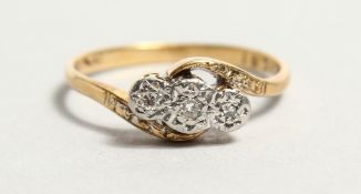 AN 18CT GOLD TWIST RING